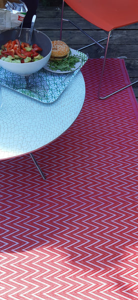 Natte plastique africaine rose et fuscha